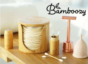Eco-vriendelijke badkamer essentials van Bamboozy: herbruikbare wattenschijfjes, menstruatiecups en meer.