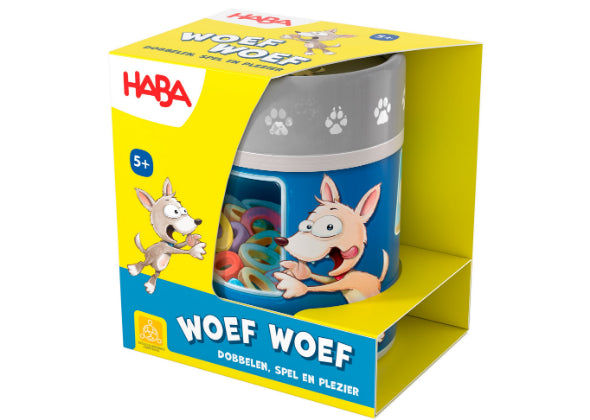 Een kleurrijke Dobbelbeker - Woef Woef doos van Haba Spellen, met een cartooneske hond en botvormige stukjes. Op de geel met blauwe verpakking staat dat het geschikt is voor 5+.